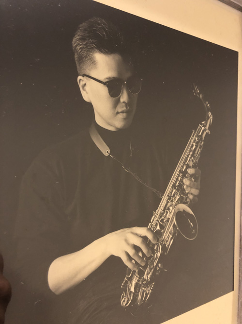 A young Daishima with his saxophone